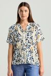Isidora button V neck top