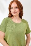 Embroidered applique top